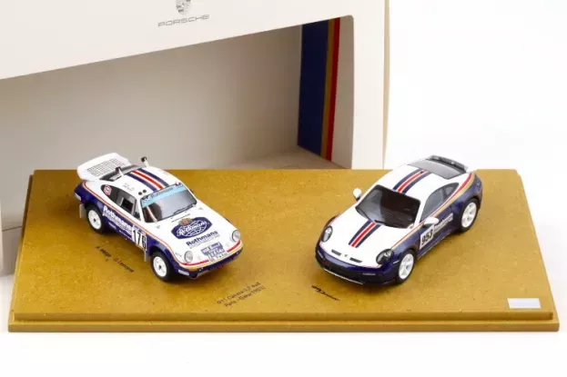 Spark Porsche Set 2x 911 953 Rothmans N 176 Winner Rally Dakar 1984 Rene Metge Dominique Lemoyne + 911 992 N 953 Roughroads Rally Dakar 2023 1:43 WAP0201560PSET