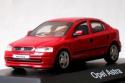 OPEL Astra sedan die-cast model, 1/43 scale, SCHUCO, red.
