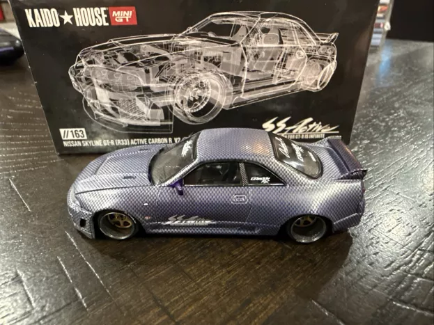 Mini GT Nissan Skyline Gt-r r33 Active Carbon R V2 1995 1:64 KHMG163